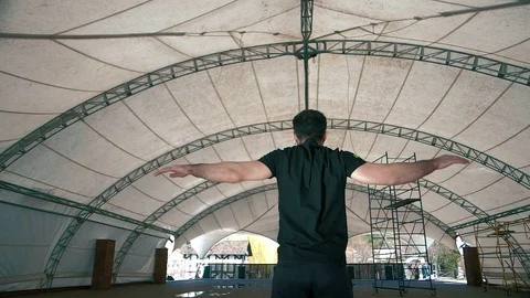 Athletic man doing exercise outdoors in slow motion in a beautiful place Stock Footage 105970333