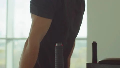 Athletic Man Doing Parallel Bar Dips in Gym Stock Footage 166433581