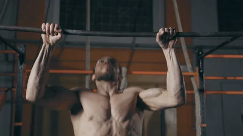 Athletic man doing pull ups Stock Footage 153058198