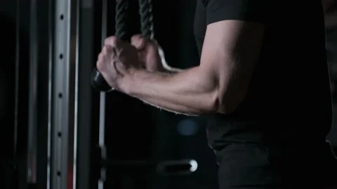 Athletic man doing triceps exercises Stock Footage 142279704