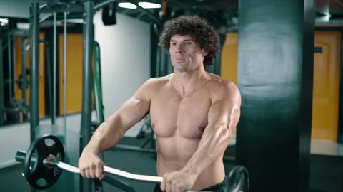 Athletic man doing weight lifting. Stock Footage 160939100