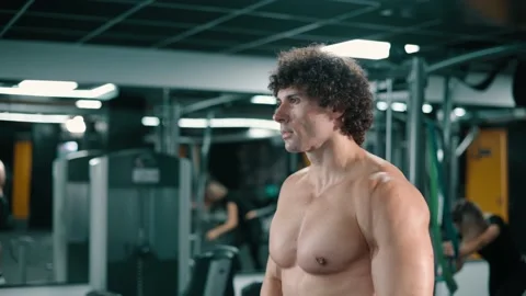 Athletic man doing weight lifting. Stock Footage 162988145