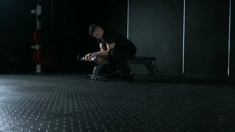 Athletic man doing wrist bending Stock Footage 142279699