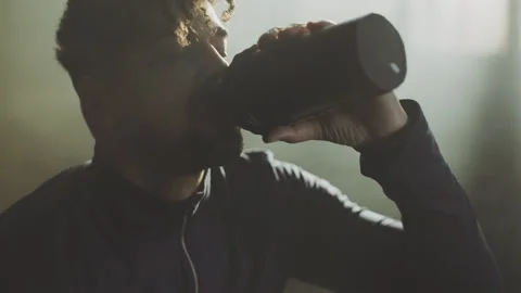 Athletic man drinking water Stock Footage 236192142