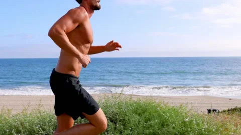 Athletic Man Exercising At The  Beach Vídeo Stock 219887640