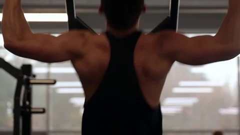 Athletic man is exercising during workout in the gym. Stock Footage 70498553