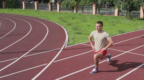 Athletic man exercising outdoors Stock Footage 65728985