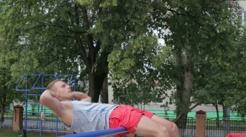 Athletic man exercising outdoors Stock Footage 65831733