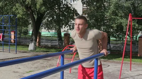 Athletic man exercising outdoors Stock Footage 65833206
