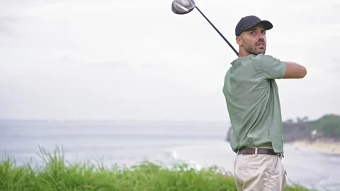 Athletic Man at Golf Course Playing Game in Nature and Hitting Ball with Club Stock Footage 261954903
