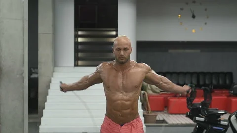 Athletic man with jump rope Video stock 131384638