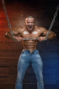 Athletic man middle plan with chain Stock Photos