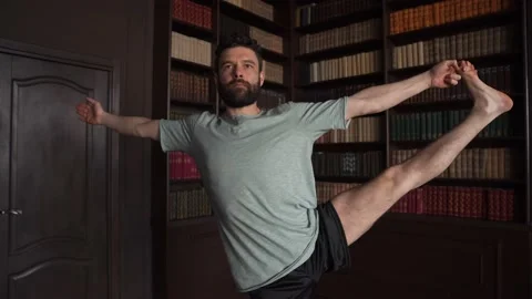 Athletic Man Practising Yoga Exercises at Home Video stock 152566945