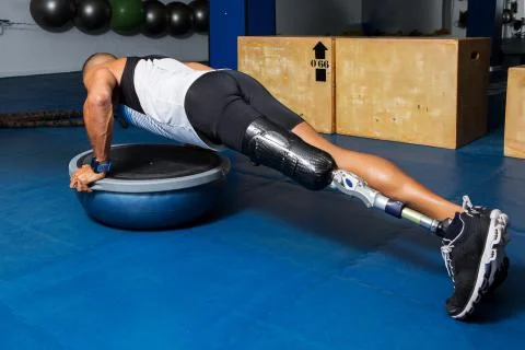 Athletic man with prosthesis training Stock Photos