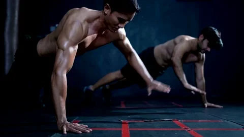 Athletic man push up and handshake during cross training at fitness gym. Heal Stock Footage 199563898