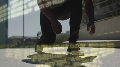 Athletic man reaching down and tying shoelace, preparing to run, while stock 스톡 동영상 332625640