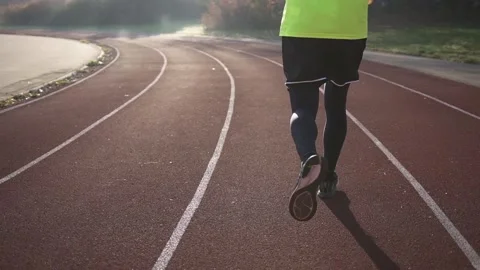 Athletic Man runner running on stadium track. Stock Footage 151045957
