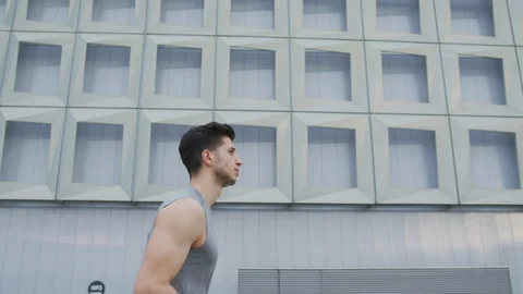 Athletic man running Stock Footage 100030876