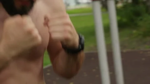 Athletic Man Shadowboxing Outdoors Video stock 330044265