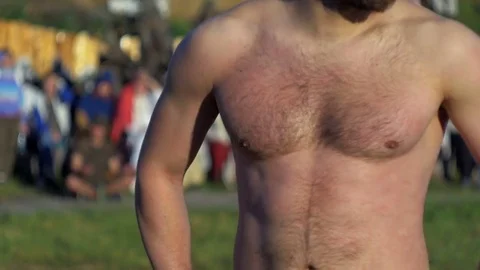 Athletic man standing in the field Stock Footage 82406874