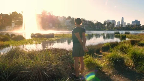 Athletic Man Stretching in Front of  a Small Lake 스톡 동영상 87380803