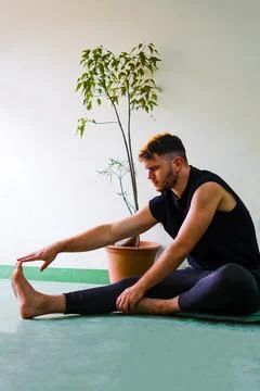 Athletic man stretching Stock Photos