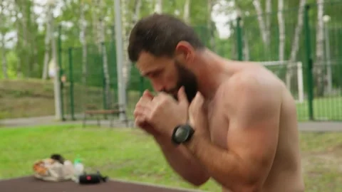 Athletic Man Training Boxing Outdoors 스톡 동영상 330044271