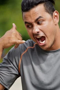 Athletic Man Using Cell Phone And Unhappy Stock Photos