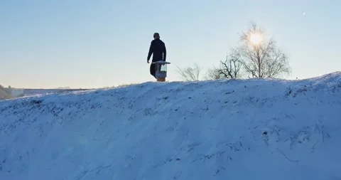 Athletic man Is walking Through The Snow - slow motion Stock Footage 146539341