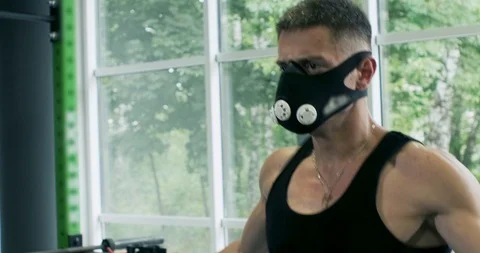 Athletic Man working out with a jump-rope. Close up, slow motion Stock Footage 116972715
