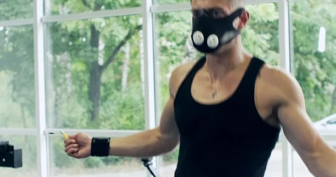 Athletic Man working out with a jump-rope. Close up, slow motion Stock Footage 117070428