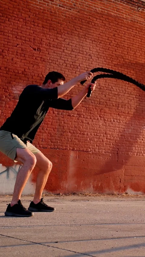 Athletic man working out in Los Angeles. Vertical video. Video stock 337139944