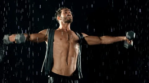 Athletic Man Working Out In The Rain Video stock 90187426