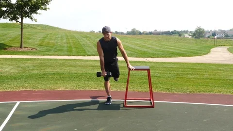 Athletic man working out training exercising 1 leg deadlifts, 4k, 60fps. Stock Footage 116146516