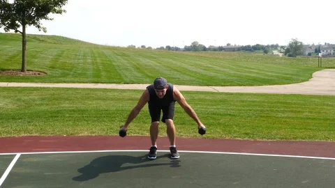 Athletic man working out training exercising, side shoulder raises, 4k, 60fps. Stock Footage 116146594