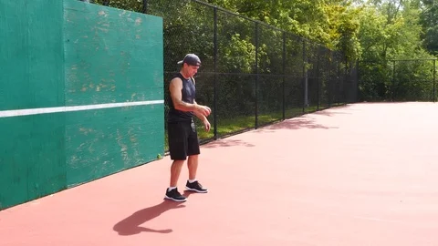 Athletic man working out training exercising coordination dribbling, 4k, 60fps. Stock Footage 116146883