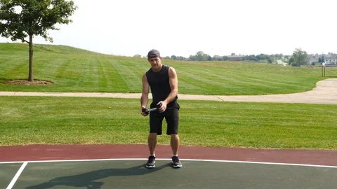 Athletic man working out training exercising dumbbell core woodchop, 4k, 60fps. Stock Footage 116147479