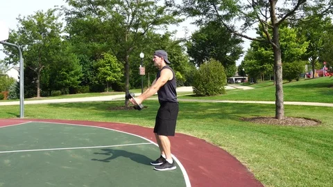 Athletic man working out training exercising shoulder raises, 4k. Stock Footage 116147916