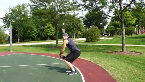 Athletic man working out training exercising, dumbbell wood chop exercise, 4k. Stock Footage 116149394