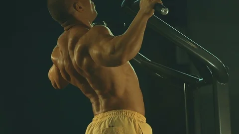 Athletic men pumping up back muscles workout fitness and bodybuilding Video stock 118775035