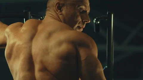 Athletic men pumping up back muscles workout fitness and bodybuilding Video stock 118775063