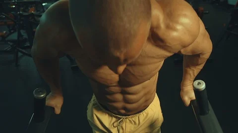 Athletic men pumping up muscles push-ups Video stock 118774920