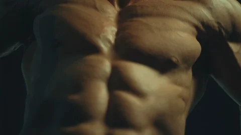 Athletic men pumping up muscles push-ups on uneven bars Video stock 118776306