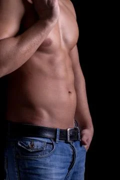 Athletic muscular man posing Stock Photos