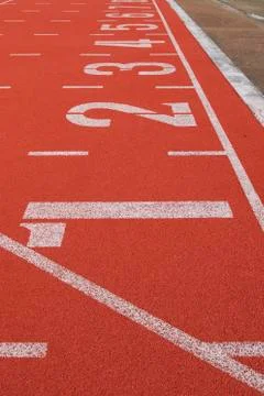 Athletic running track in stadium Stock Photos