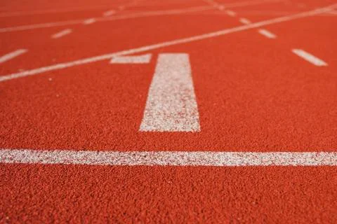 Athletic running track in stadium Stock Photos