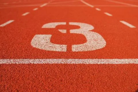 Athletic running track in stadium Stock Photos