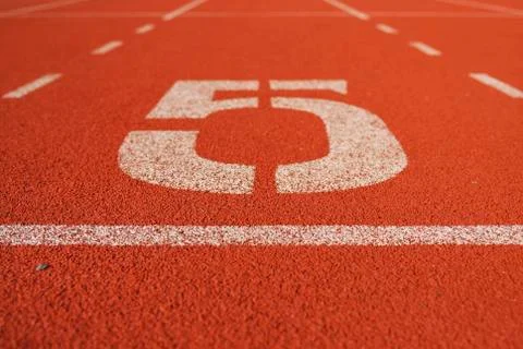 Athletic running track in stadium Stock Photos