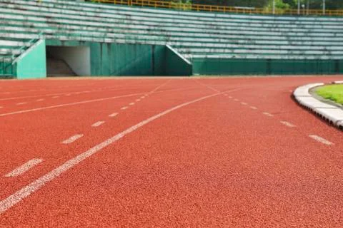 Athletic running track in stadium Stock Photos