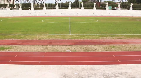 Athletic track stadium, steady cam shoot Stock Footage 54800625